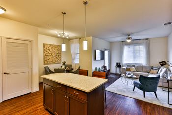 Furnished kitchen with floating kitchen island